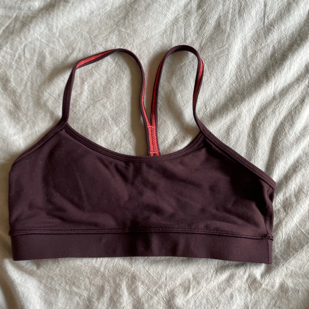 Lululemon plum sports bra with coral stitching